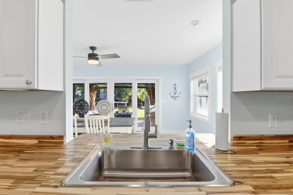3619 North Suwanee Point Crystal River, FL 34428 - Photo 15 of 54 a kitchen with sink and granite counter top