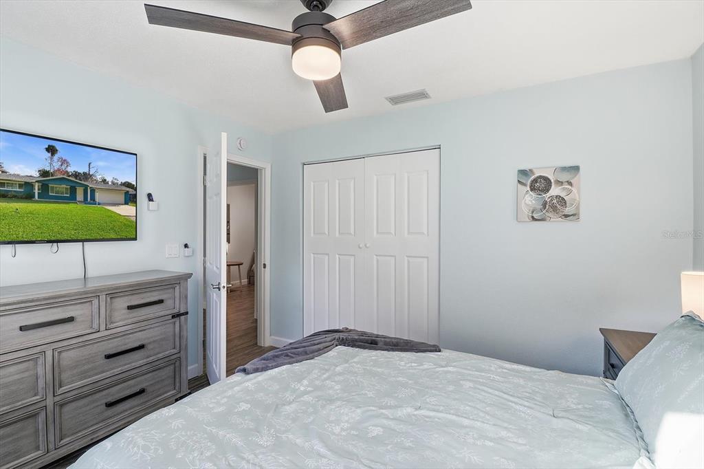 3619 North Suwanee Point Crystal River, FL 34428 - Photo 22 of 54 a bedroom with a bed and a dresser