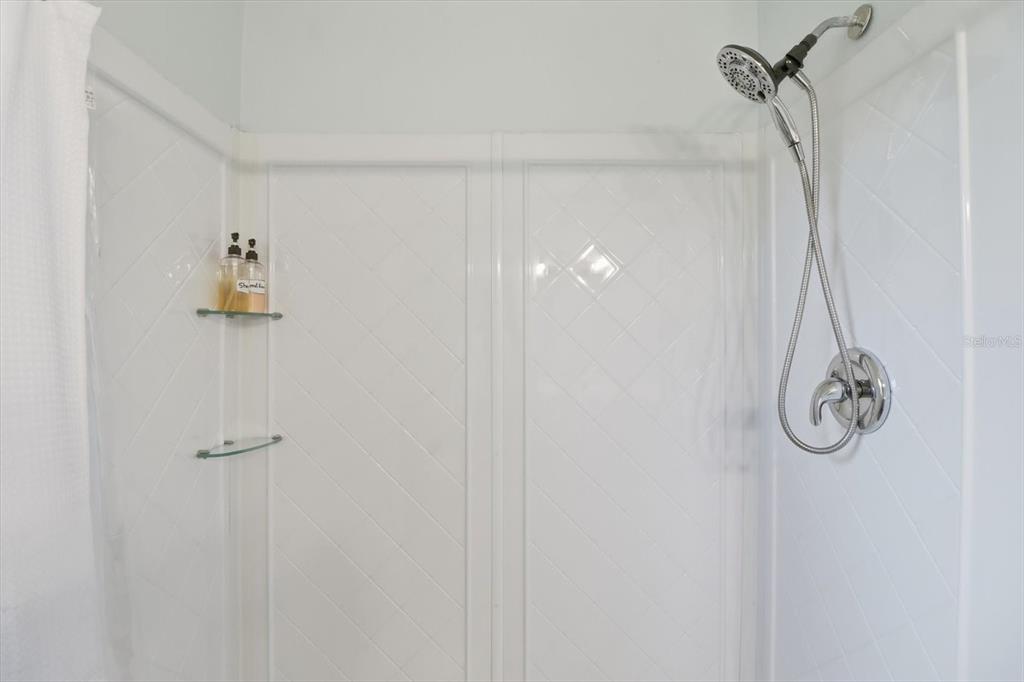 3619 North Suwanee Point Crystal River, FL 34428 - Photo 24 of 54 a bathroom with a shower