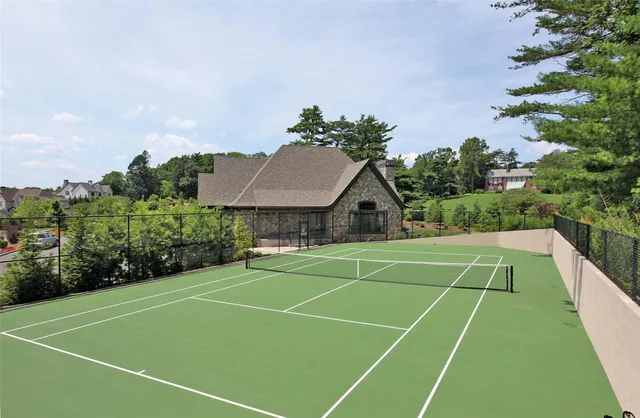 a view of swimming pool from a balcony
