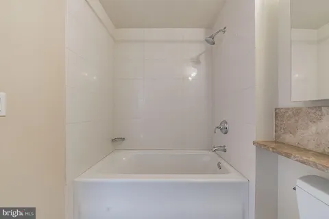 a bathroom with a bathtub