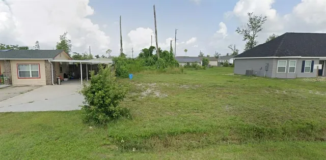 a view of a house with a garden