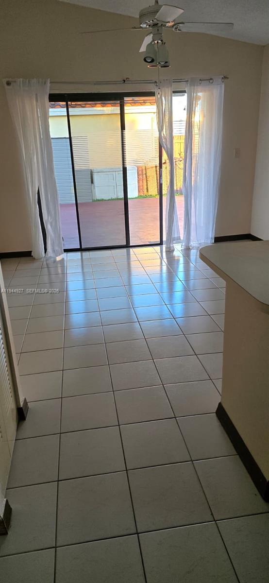 8906 Southwest 6th Lane Miami, FL 33174 - Photo 5 of 12 a view of an empty room with a window