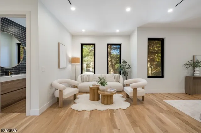 a living room with furniture and window