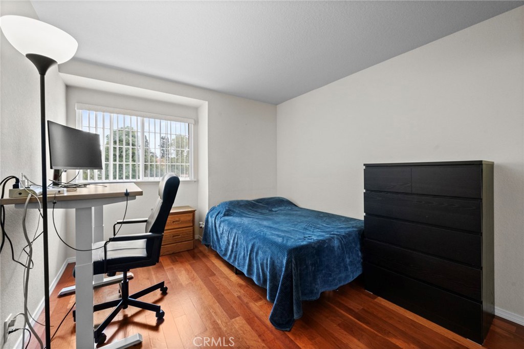 605 Bronco Way Walnut, CA 91789 - Photo 32 of 69 a bedroom with a bed and a flat screen tv
