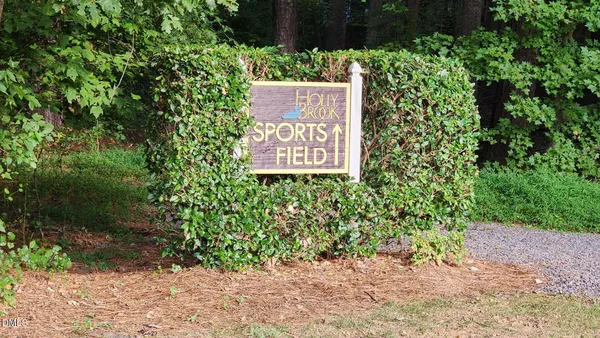 a sign on the side of the road