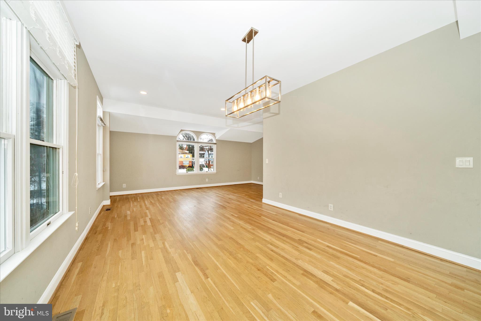 3313 Moline Road Silver Spring, MD 20902 - Photo 18 of 66 a view of a room with wooden floor and windows