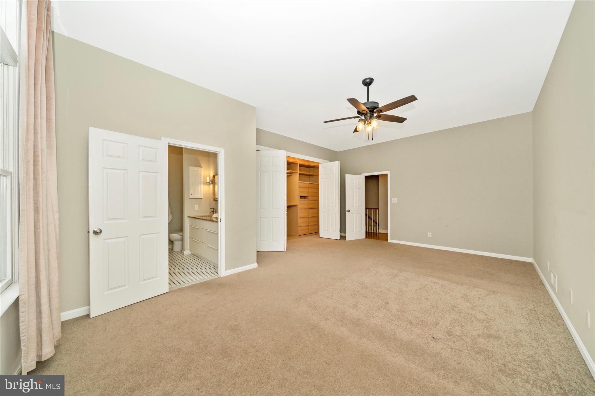 3313 Moline Road Silver Spring, MD 20902 - Photo 28 of 66 an empty room with closet and ceiling fan