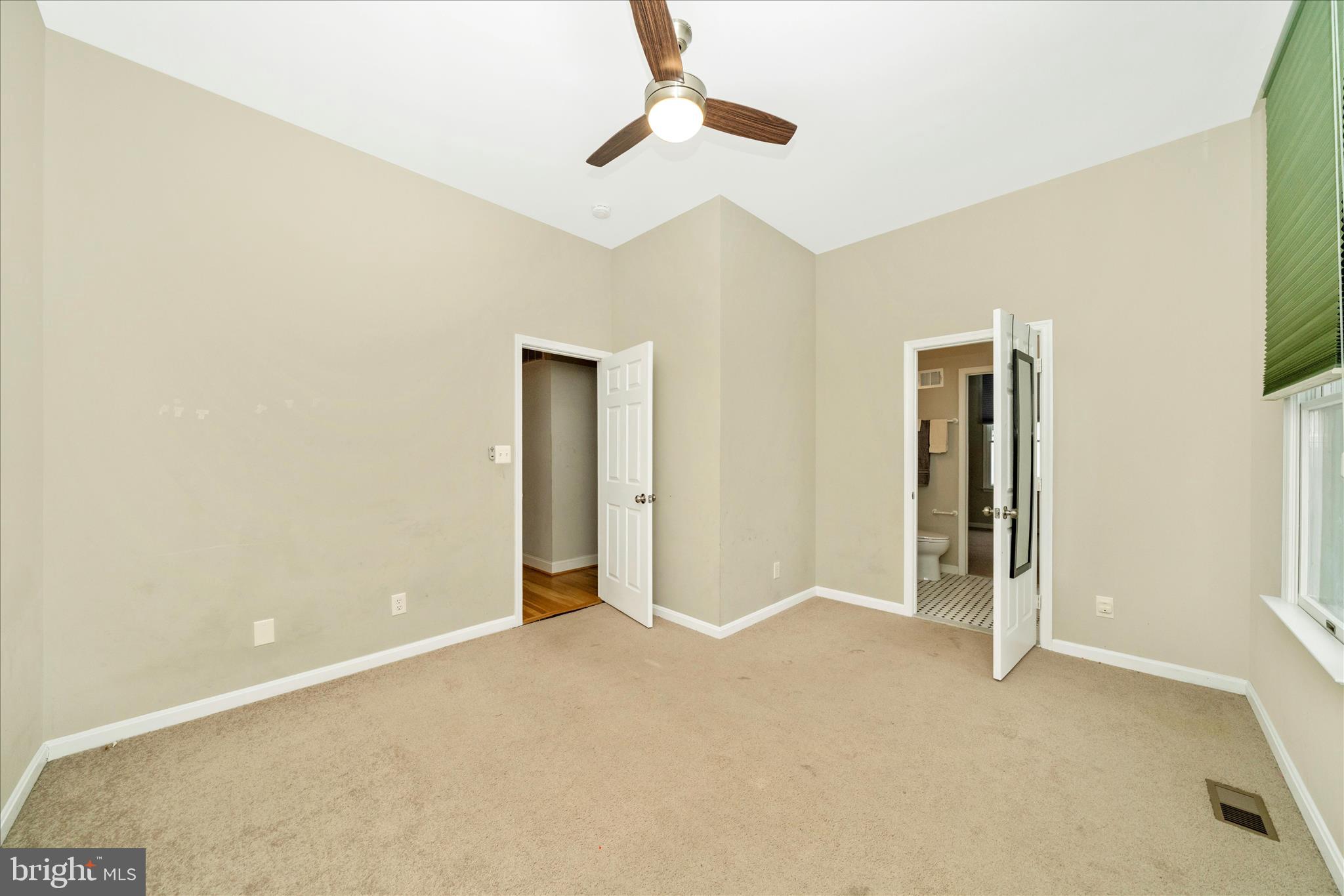 3313 Moline Road Silver Spring, MD 20902 - Photo 34 of 66 a view of an empty room with a ceiling fan