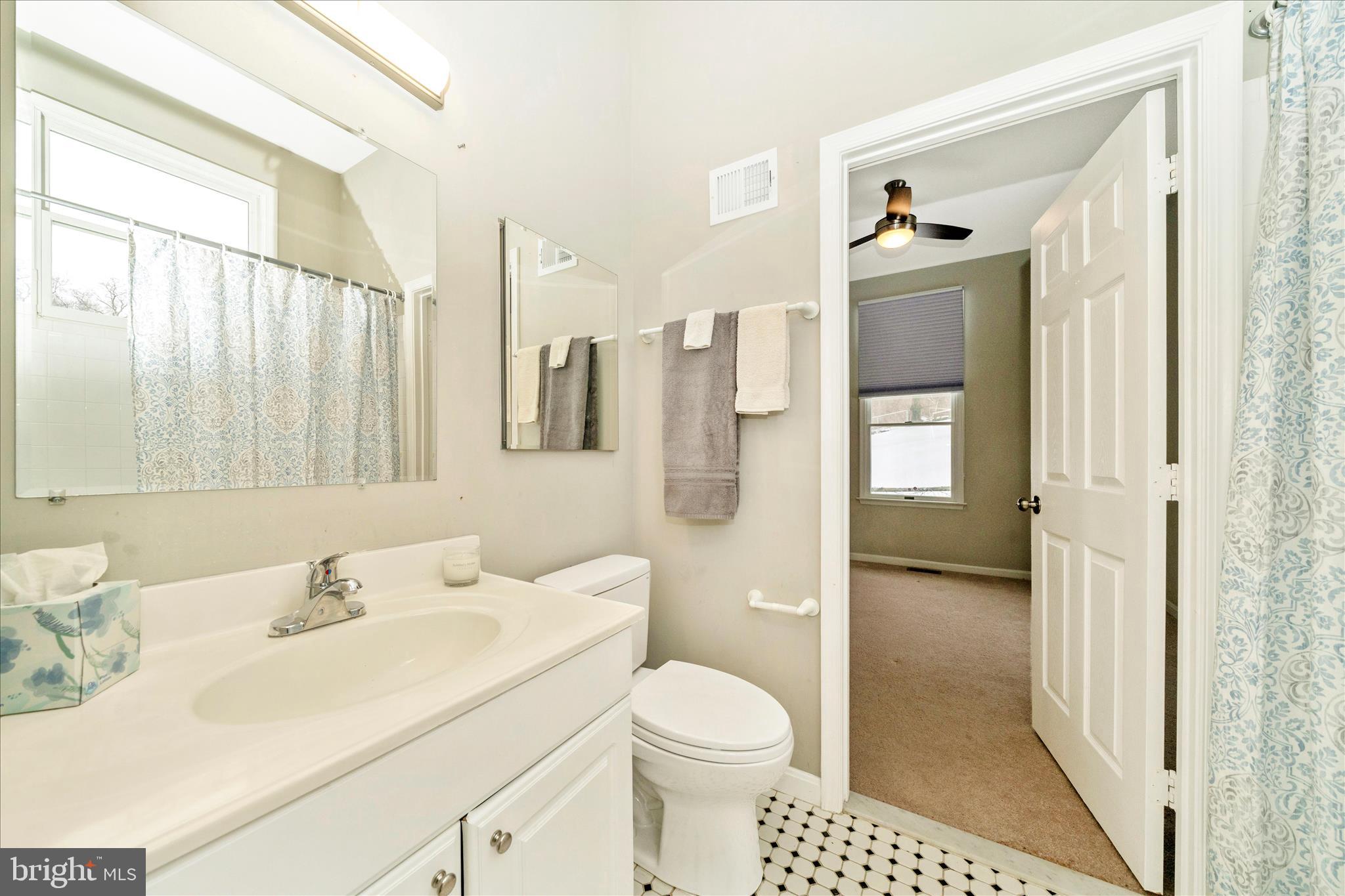 3313 Moline Road Silver Spring, MD 20902 - Photo 36 of 66 a bathroom with a sink toilet and shower
