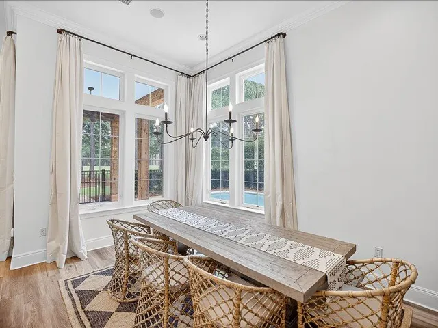 a view of a bedroom with furniture