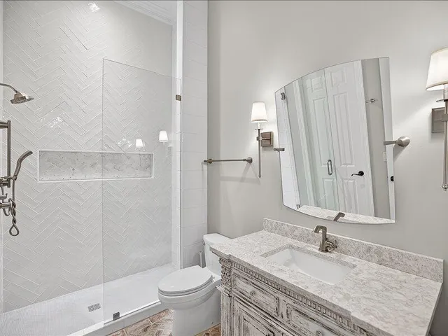 a room with pool table and windows