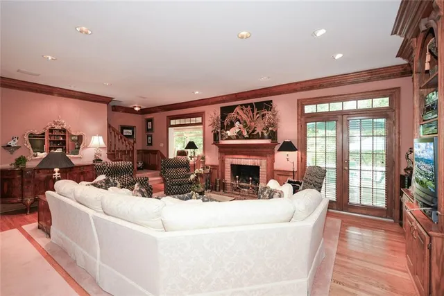 a view of an outdoor sitting area with furniture and backyard