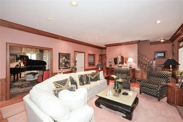 a bathroom with bathtub and window