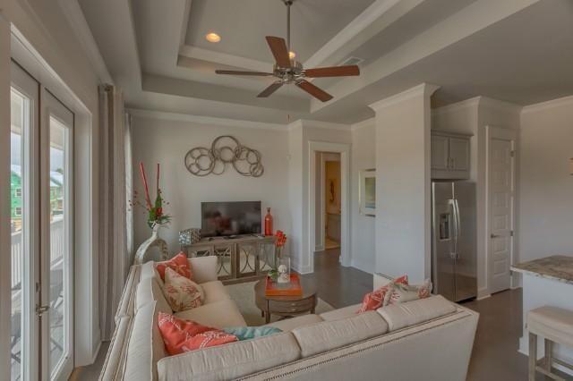 23 Milestone Dr Inlet Beach, Unit C Inlet Beach, FL 32461 - Photo 7 of 12 a living room with furniture and a flat screen tv