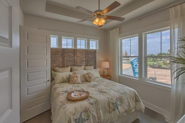 23 Milestone Dr Inlet Beach, Unit C Inlet Beach, FL 32461 - Photo 8 of 12 a bedroom with a bed and a window