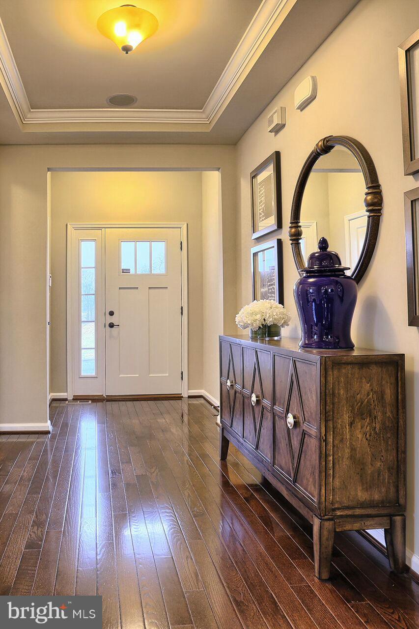 3142 Sunny Ridge Drive Odenton, MD 21113 - Photo 2 of 30 a view of a entryway door with wooden floor