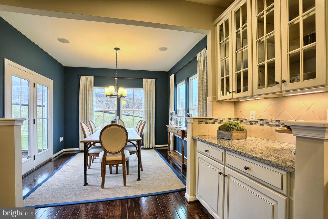3142 Sunny Ridge Drive Odenton, MD 21113 - Photo 10 of 30 a dining room with furniture and window