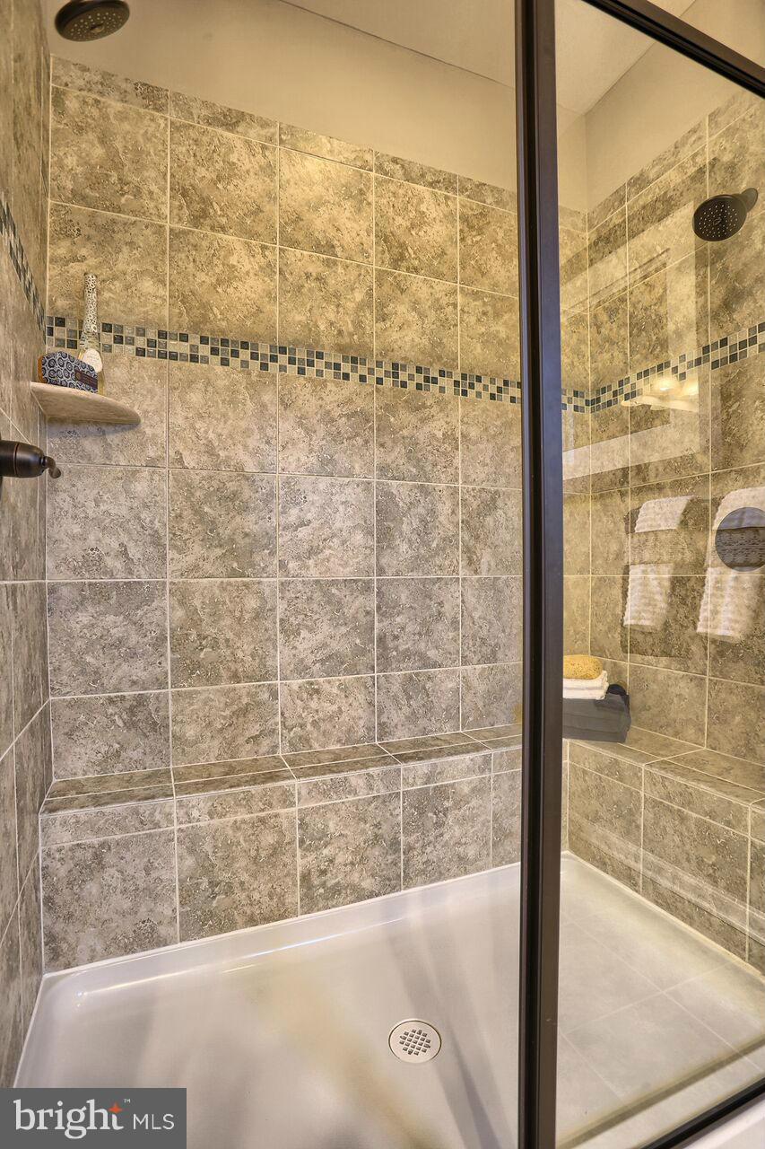 3142 Sunny Ridge Drive Odenton, MD 21113 - Photo 13 of 30 a bathroom with a bathtub