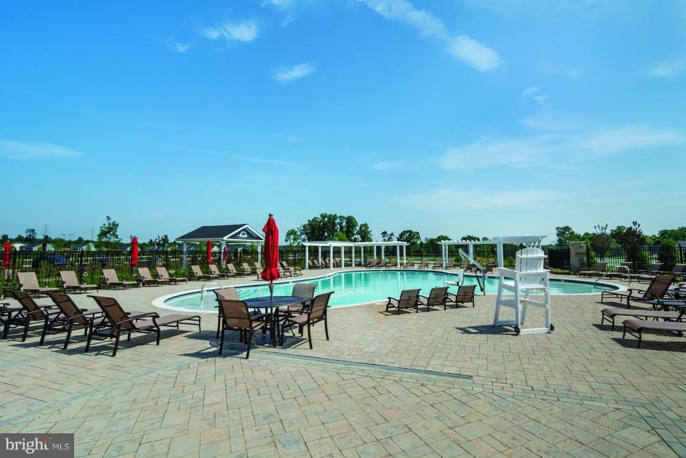 3142 Sunny Ridge Drive Odenton, MD 21113 - Photo 17 of 30 a view of a lake with outdoor seating space