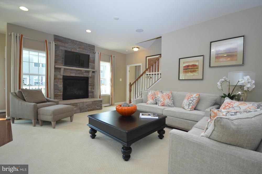 3142 Sunny Ridge Drive Odenton, MD 21113 - Photo 7 of 30 a living room with furniture fireplace and window