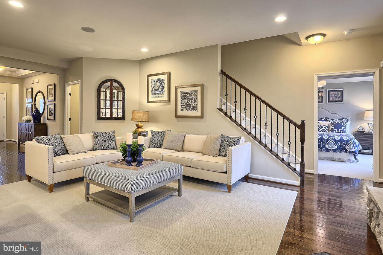 3142 Sunny Ridge Drive Odenton, MD 21113 - Photo 8 of 30 a living room with furniture and wooden floor