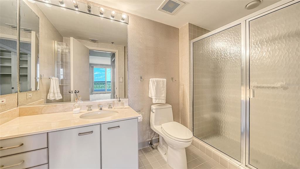 455 Longboat Club Road, Unit 608 Longboat Key, FL 34228 - Photo 25 of 57 Third bedroom with en-suite bathroom. Walk-in shower.