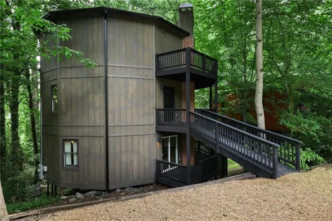 a backyard of a house with lots of green space