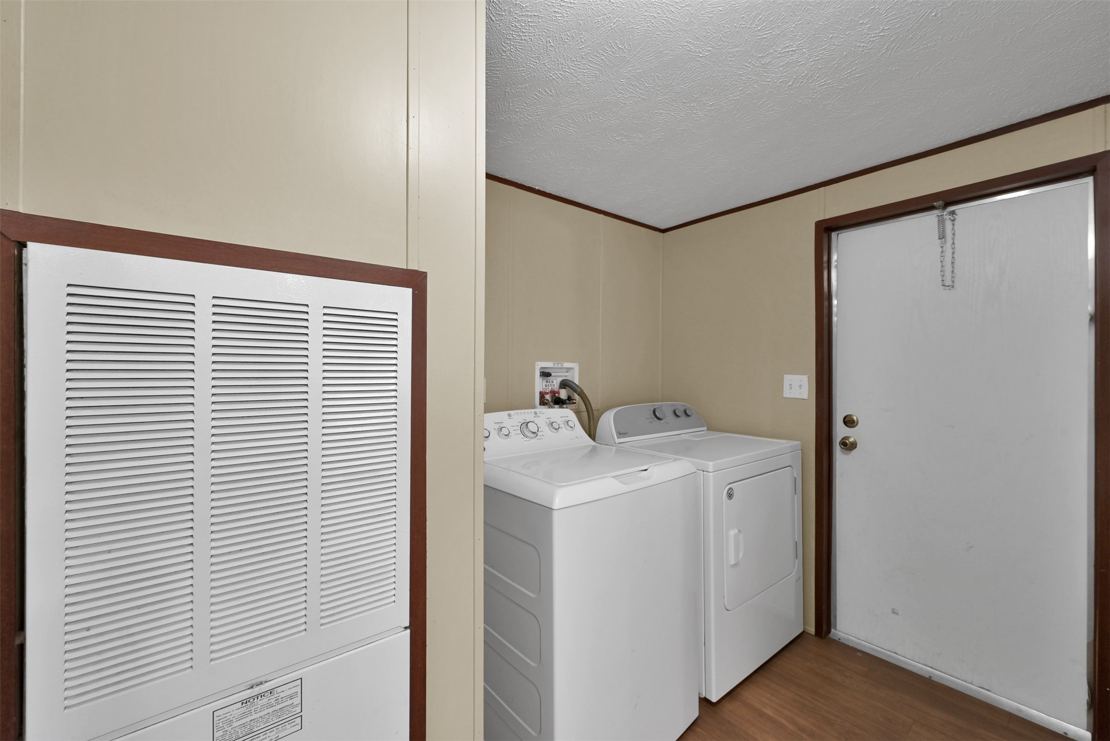 25414 T K C Road Tomball, TX 77375 - Photo 11 of 17 a utility room with a washer and dryer