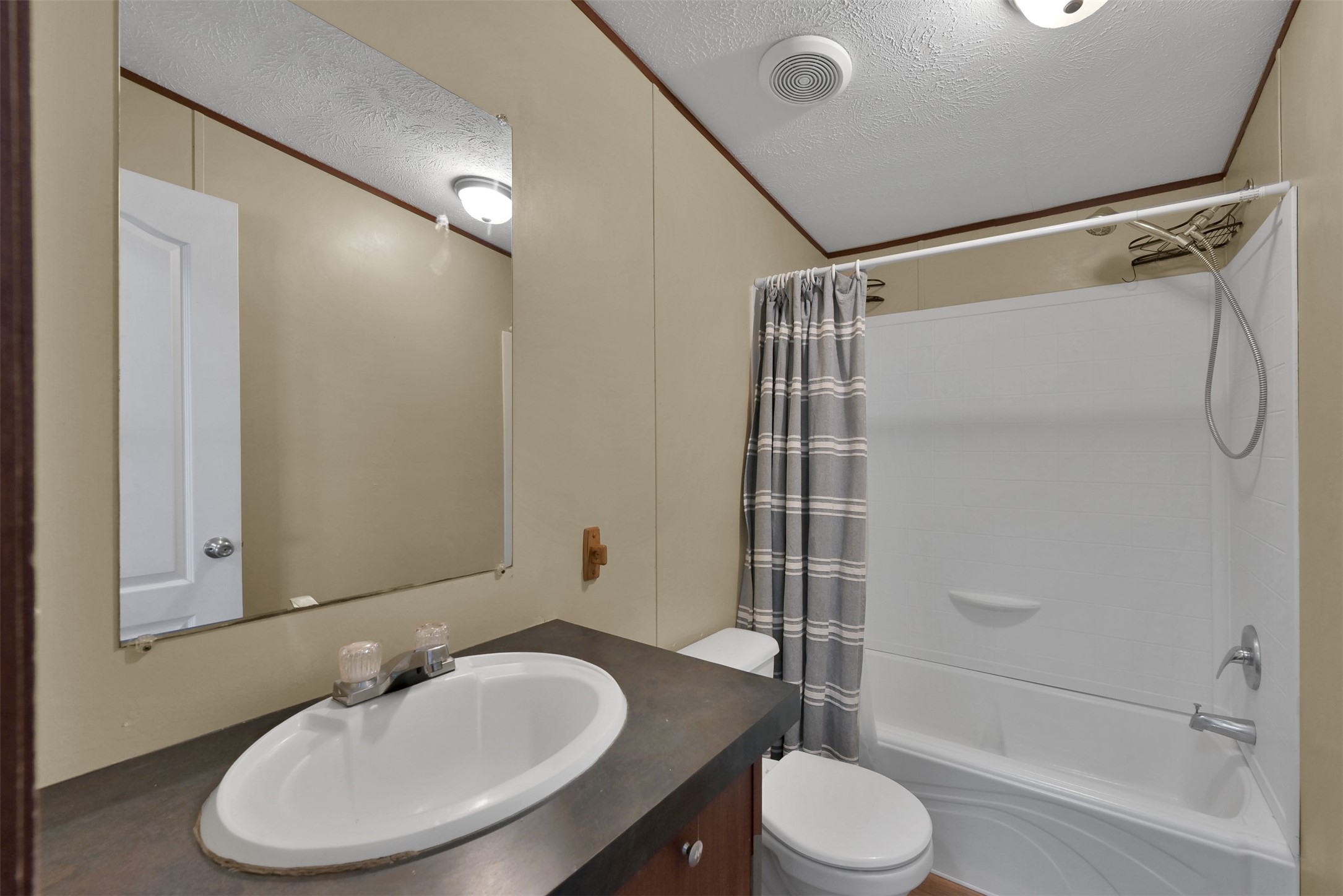 25414 T K C Road Tomball, TX 77375 - Photo 16 of 17 a bathroom with a sink toilet and shower