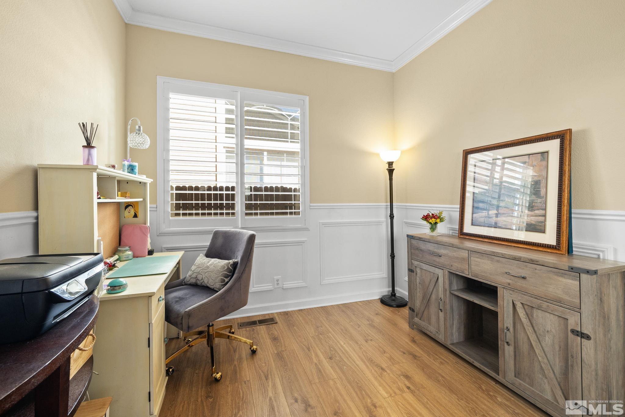 9873 Northrup Drive Reno, NV 89521 - Photo 18 of 24 a view of a workspace with furniture and a window