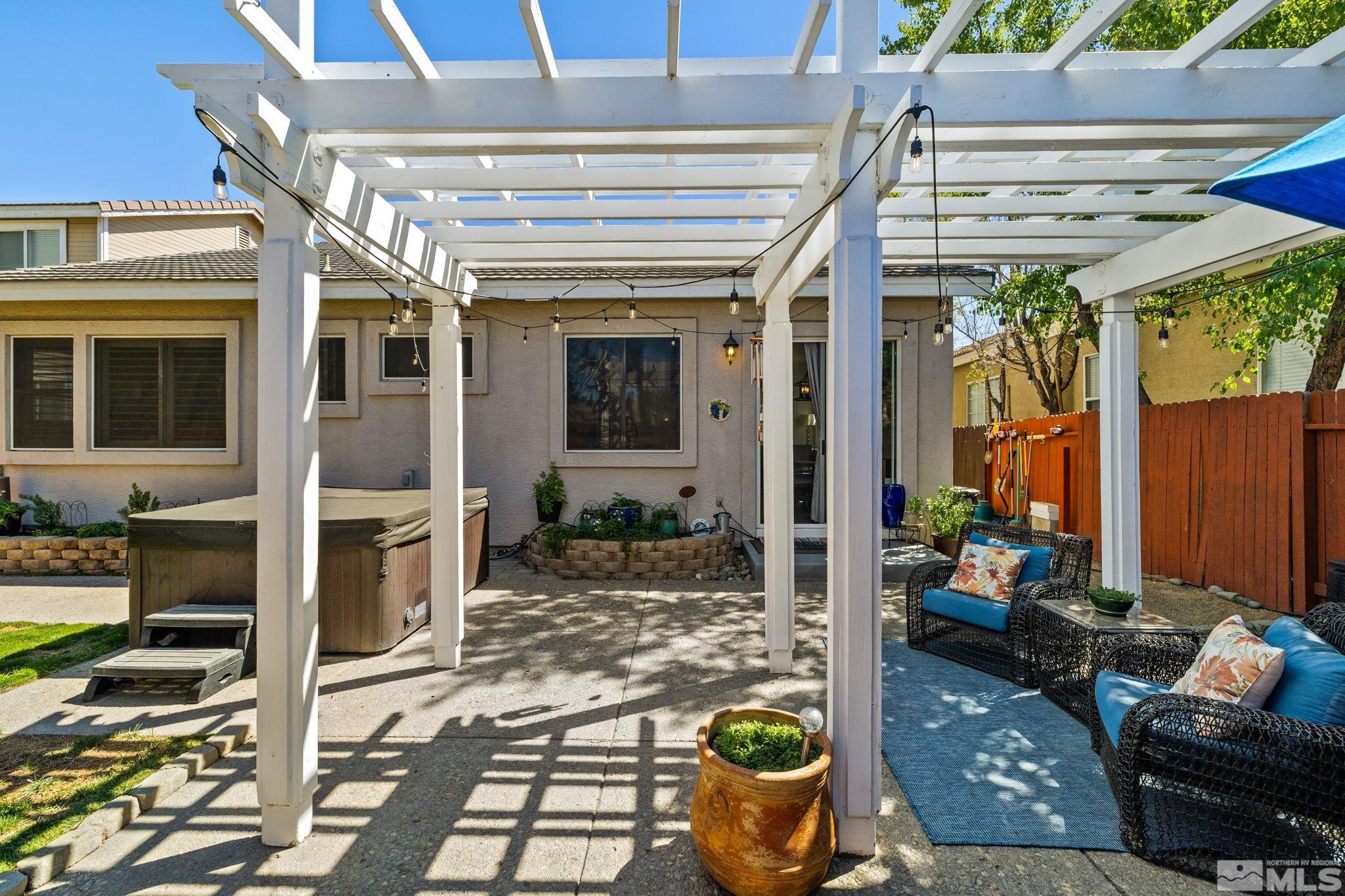 9873 Northrup Drive Reno, NV 89521 - Photo 20 of 24 a view of a porch with chairs and potted plants