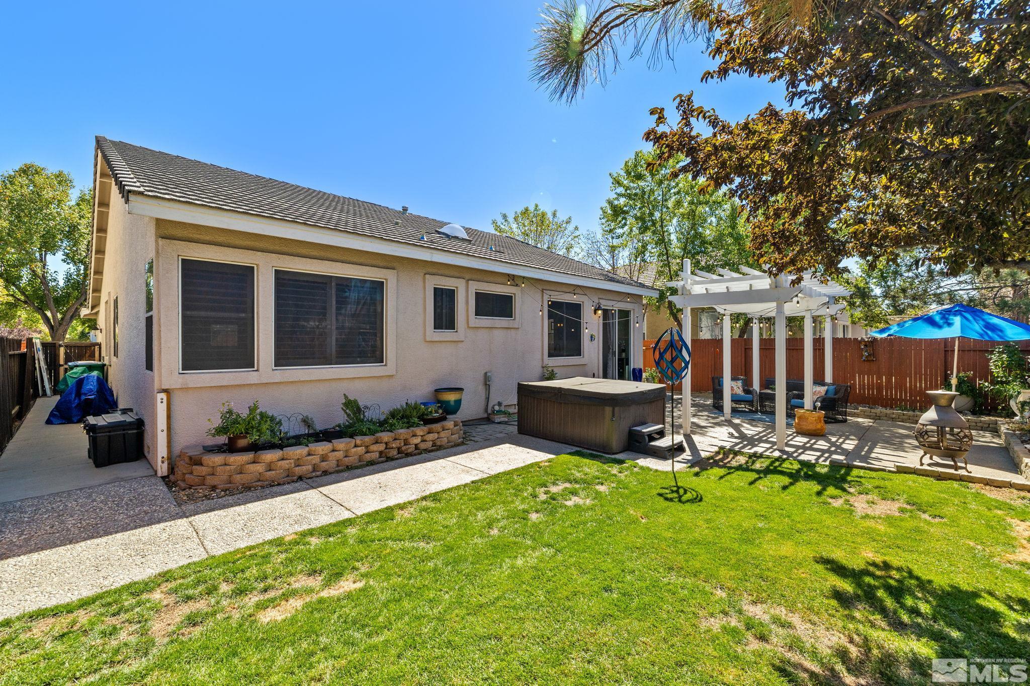 9873 Northrup Drive Reno, NV 89521 - Photo 21 of 24 a front view of a house with patio