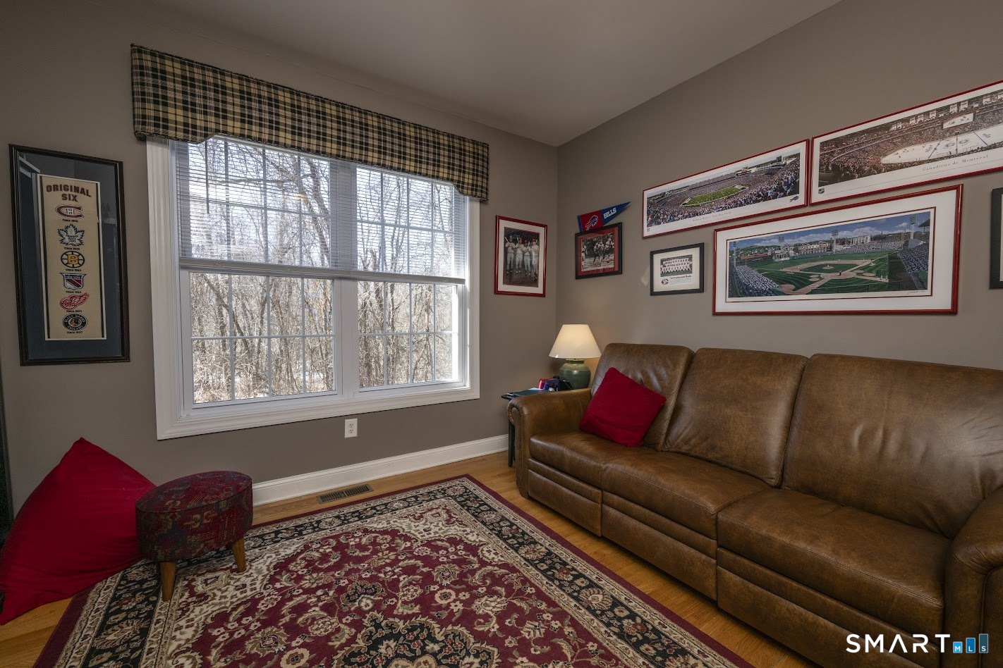 22 R Olde Yankee Way Durham, CT 06422 - Photo 14 of 29 Flexible main-level space adapts to today's lifestyle needs, perfect for working from home or accommodating overnight guests.