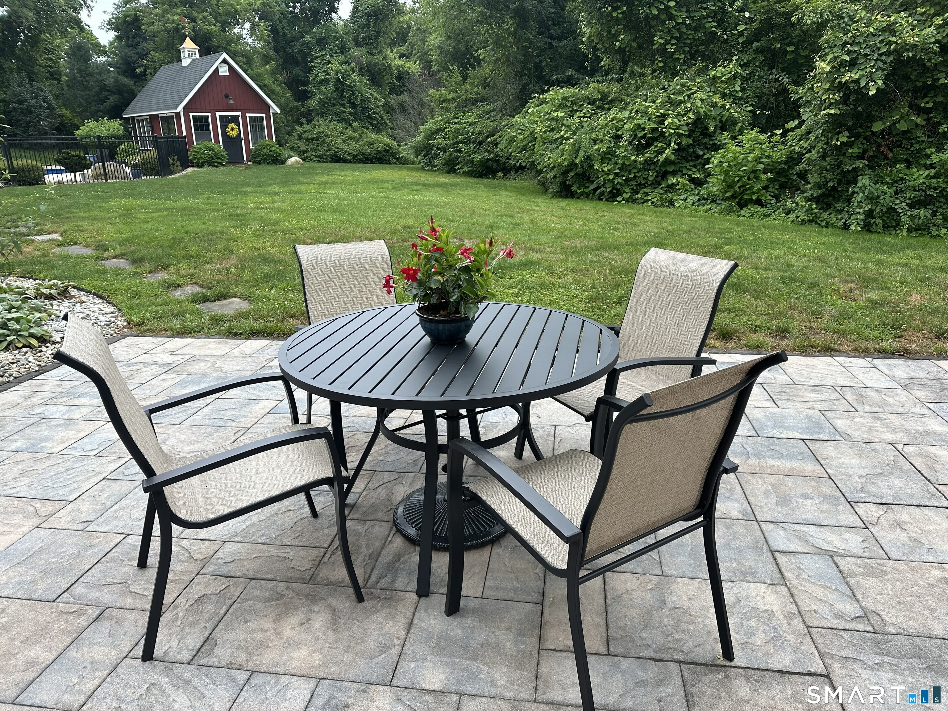 22 R Olde Yankee Way Durham, CT 06422 - Photo 29 of 29 Stone patio perfect for outdoor dining and relaxing, overlooking the spacious backyard and pool area.