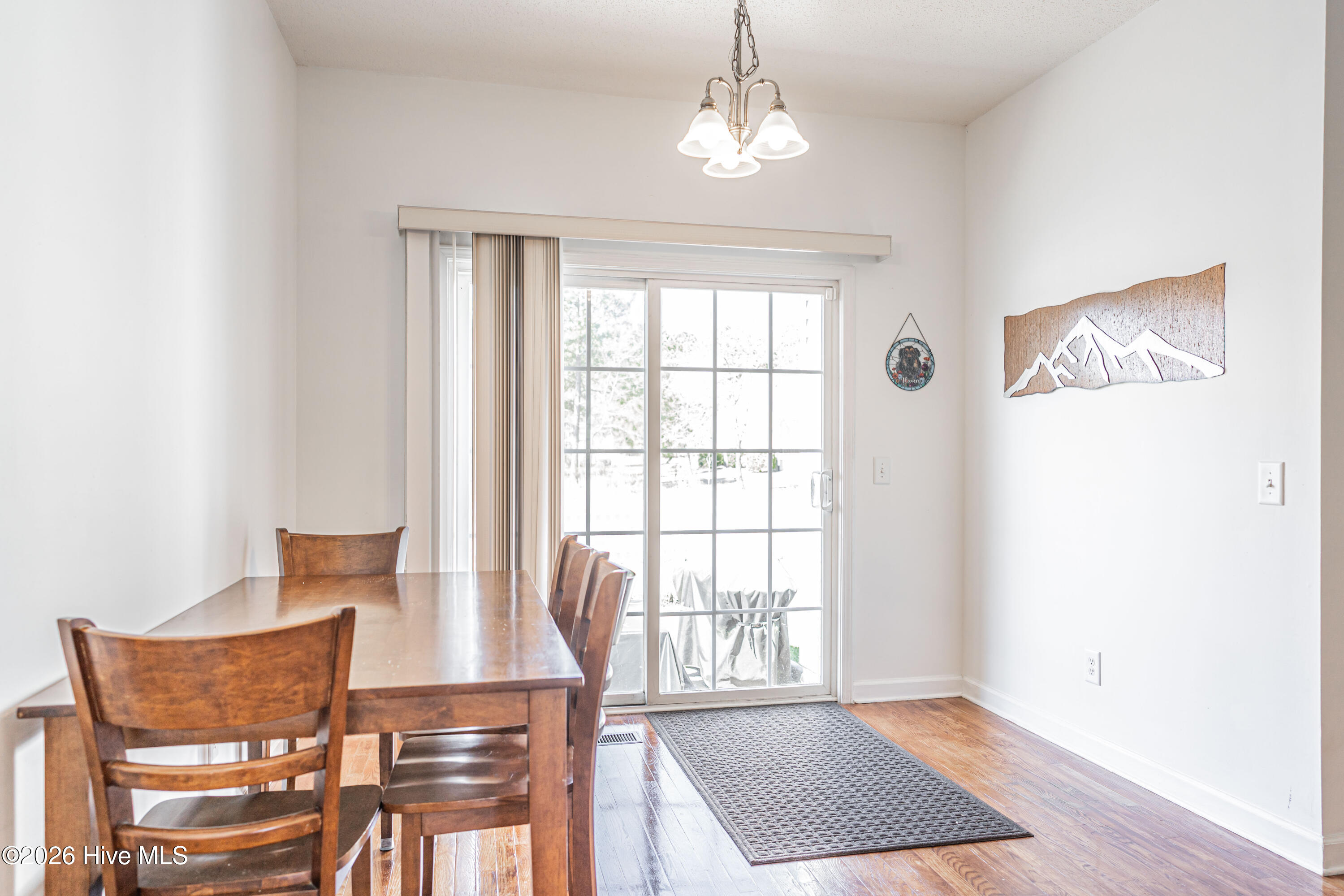 1320 Burning Tree Road Pinehurst, NC 28374 - Photo 16 of 65 Breakfast nook with slider to outside patio
