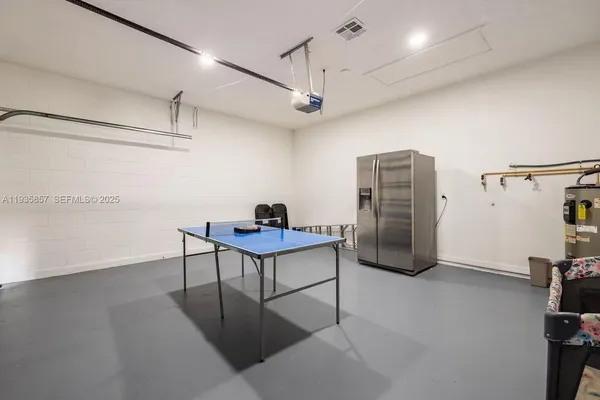 a view of a workspace with furniture