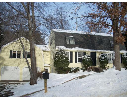 7 Stuart Place Westfield, MA 01085 - Photo 1 of 20 a front view of a house with garden