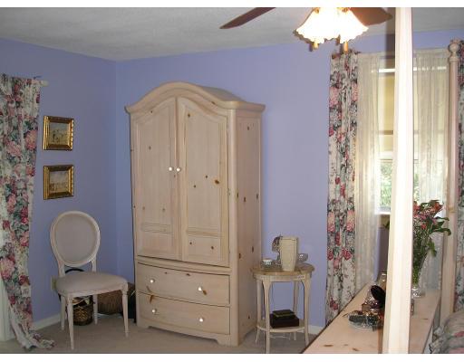 7 Stuart Place Westfield, MA 01085 - Photo 15 of 20 a view of a hallway with front door wooden cabinet and stairs