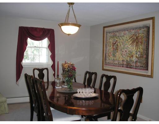 7 Stuart Place Westfield, MA 01085 - Photo 4 of 20 a view of a dining room with furniture and window