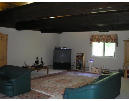 7 Stuart Place Westfield, MA 01085 - Photo 7 of 20 a living room with furniture and a fireplace