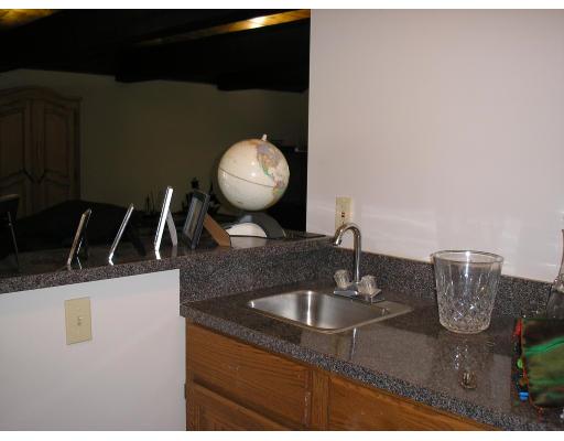 7 Stuart Place Westfield, MA 01085 - Photo 8 of 20 a bathroom with a sink and a mirror