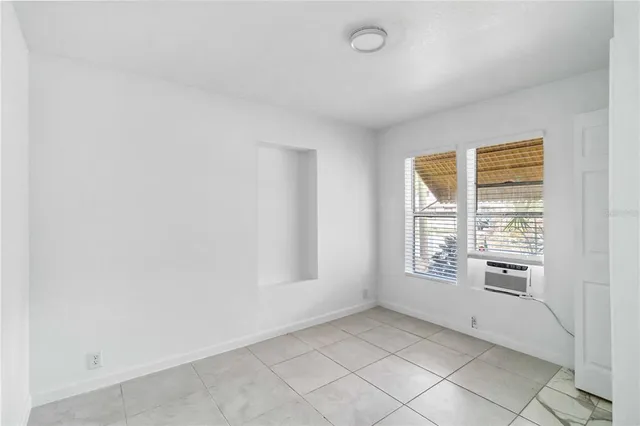 an empty room with windows