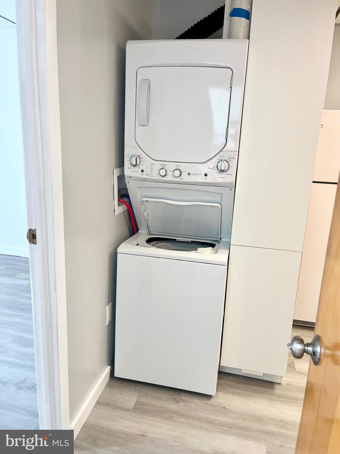 1304 Jackson Street, Unit 1 Philadelphia, PA 19148 - Photo 14 of 16 a utility room with dryer and washer