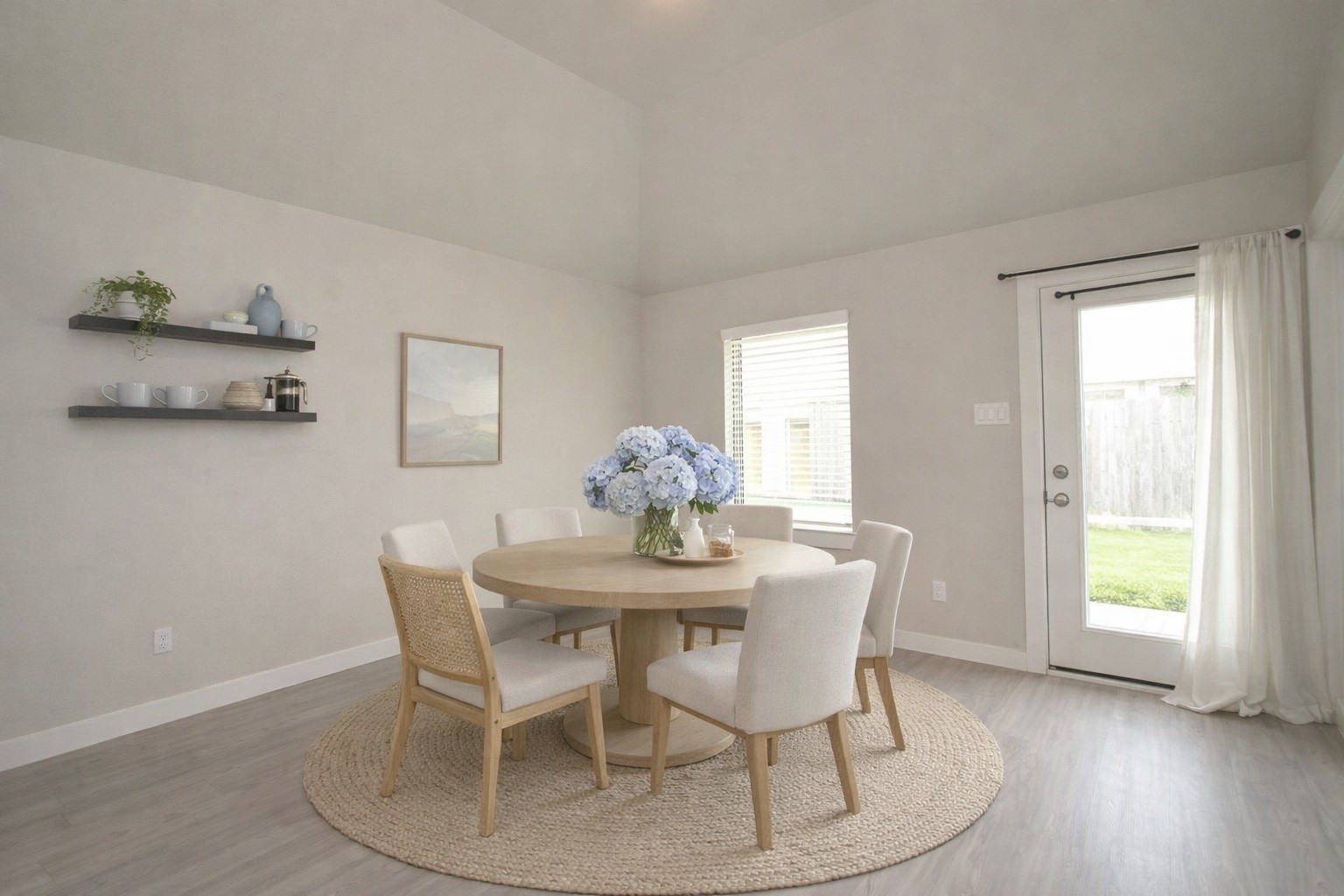 8230 Blue Fish Drive Cypress, TX 77433 - Photo 8 of 18 Oversized breakfast area off of the kitchen with access to the covered back patio.
*Virtually Staged*