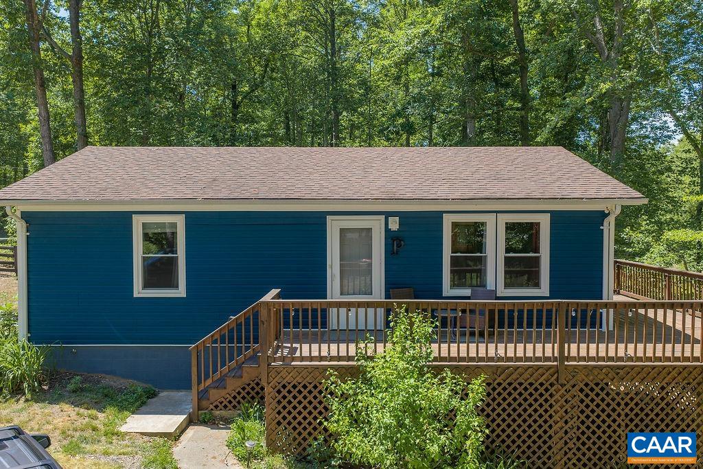 6920 Albevanna Spring Road Scottsville, VA 24590 - Photo 1 of 47 a front view of a house with a garden