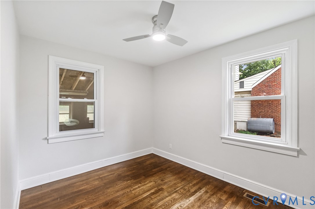 5317 River Road Petersburg, VA 23803 - Photo 14 of 19 Hardwood-finish flooring, white painted walls, whi