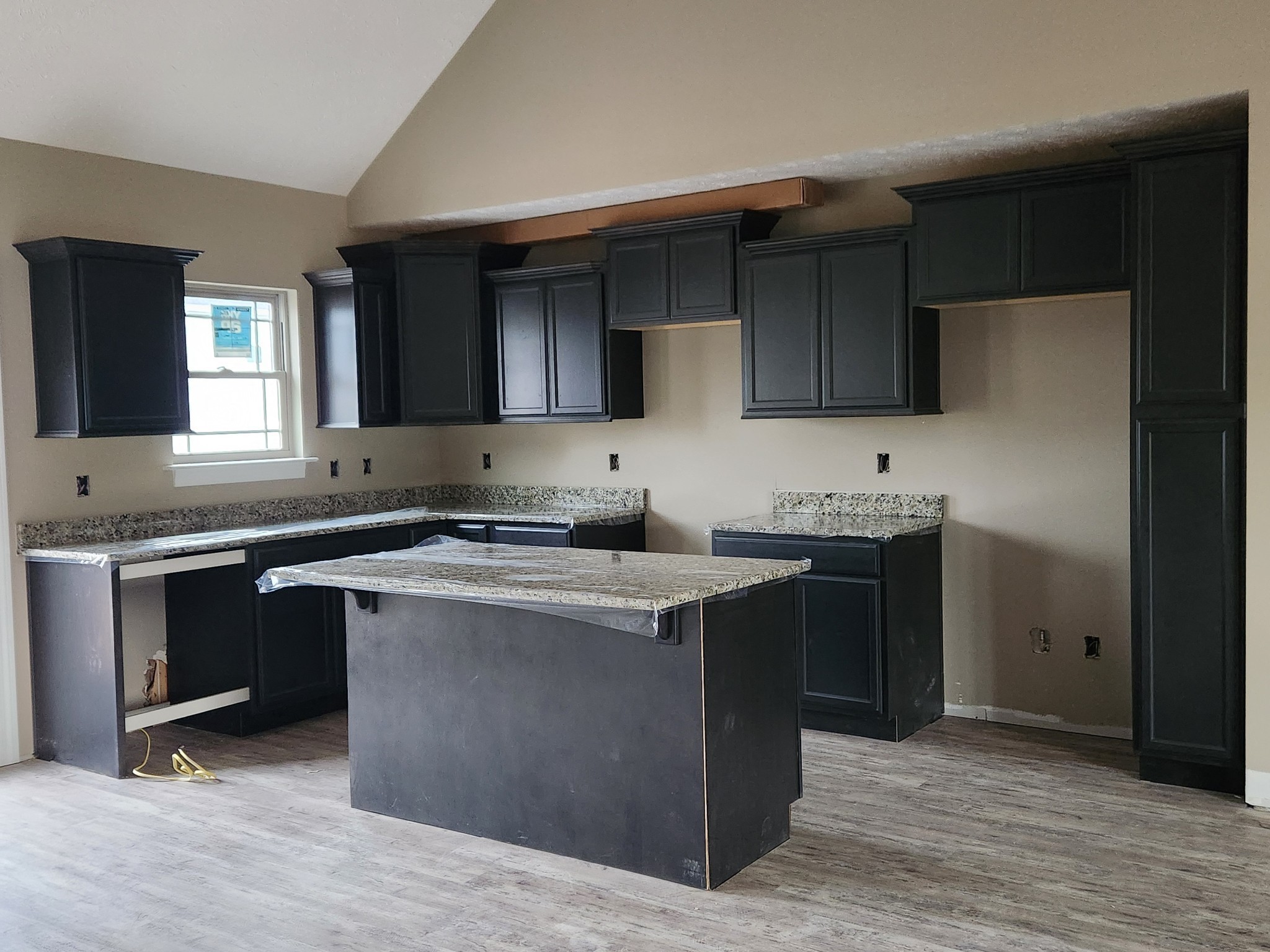 2859 Upstream Road Christiana, TN 37037 - Photo 35 of 72 a kitchen with stainless steel appliances granite countertop a sink stove and refrigerator