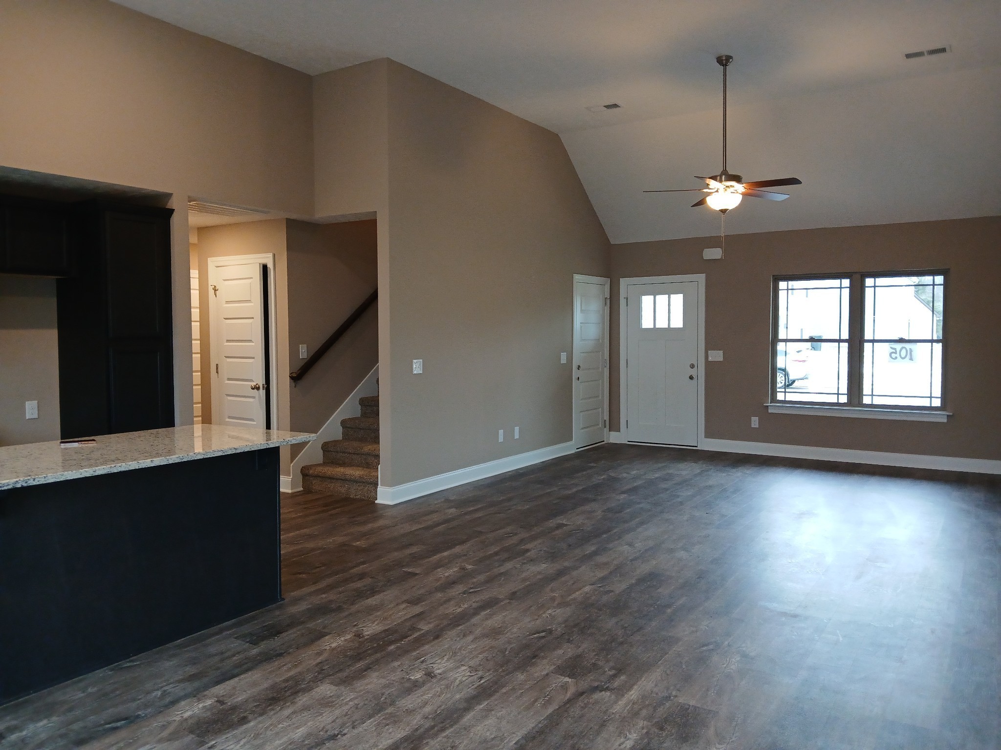 2859 Upstream Road Christiana, TN 37037 - Photo 4 of 72 an empty room with wooden floor and windows