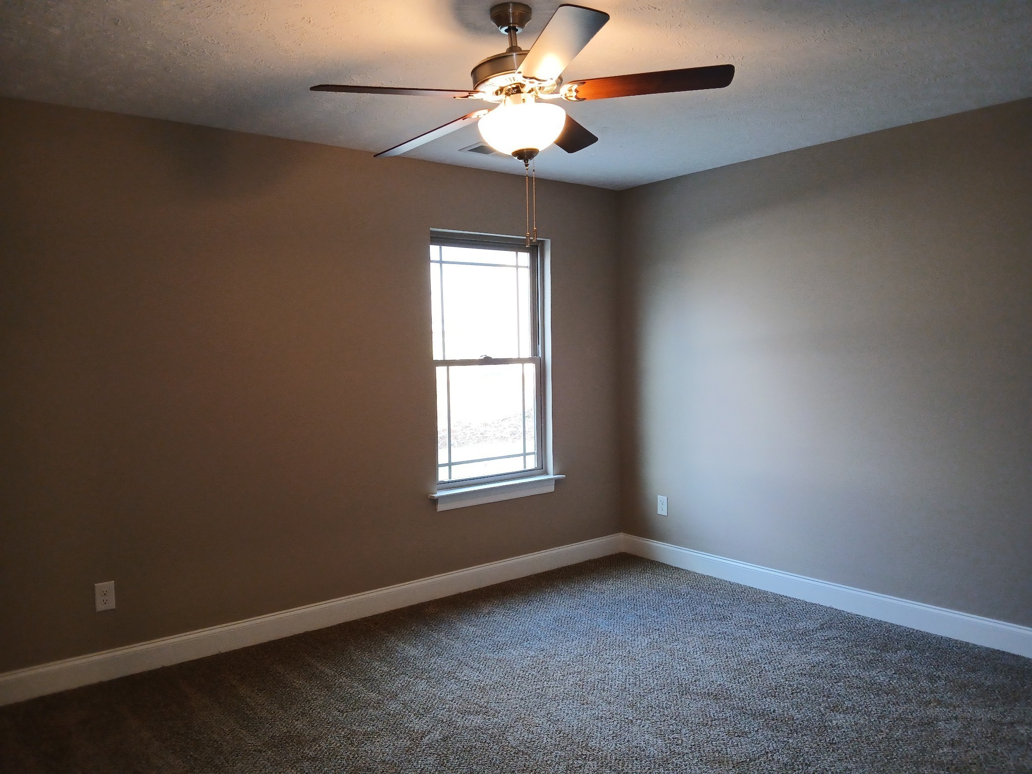 2859 Upstream Road Christiana, TN 37037 - Photo 46 of 72 an empty room with a window and a fan